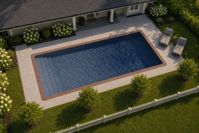Daytime render of the Lake Shore fiberglass pool with brick coping and a Ocean Blue interior, seen from above at an angle.
