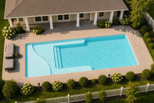 Daytime render of the Lil Bob LX fiberglass pool with cantilever coping and a Arctic Shimmer interior, seen from above at an angle.